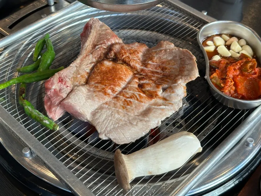 Kimchi and garlic served in a mess tin