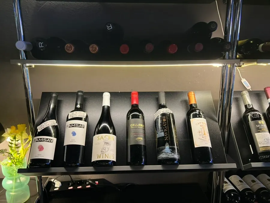Rows of wine bottles on display