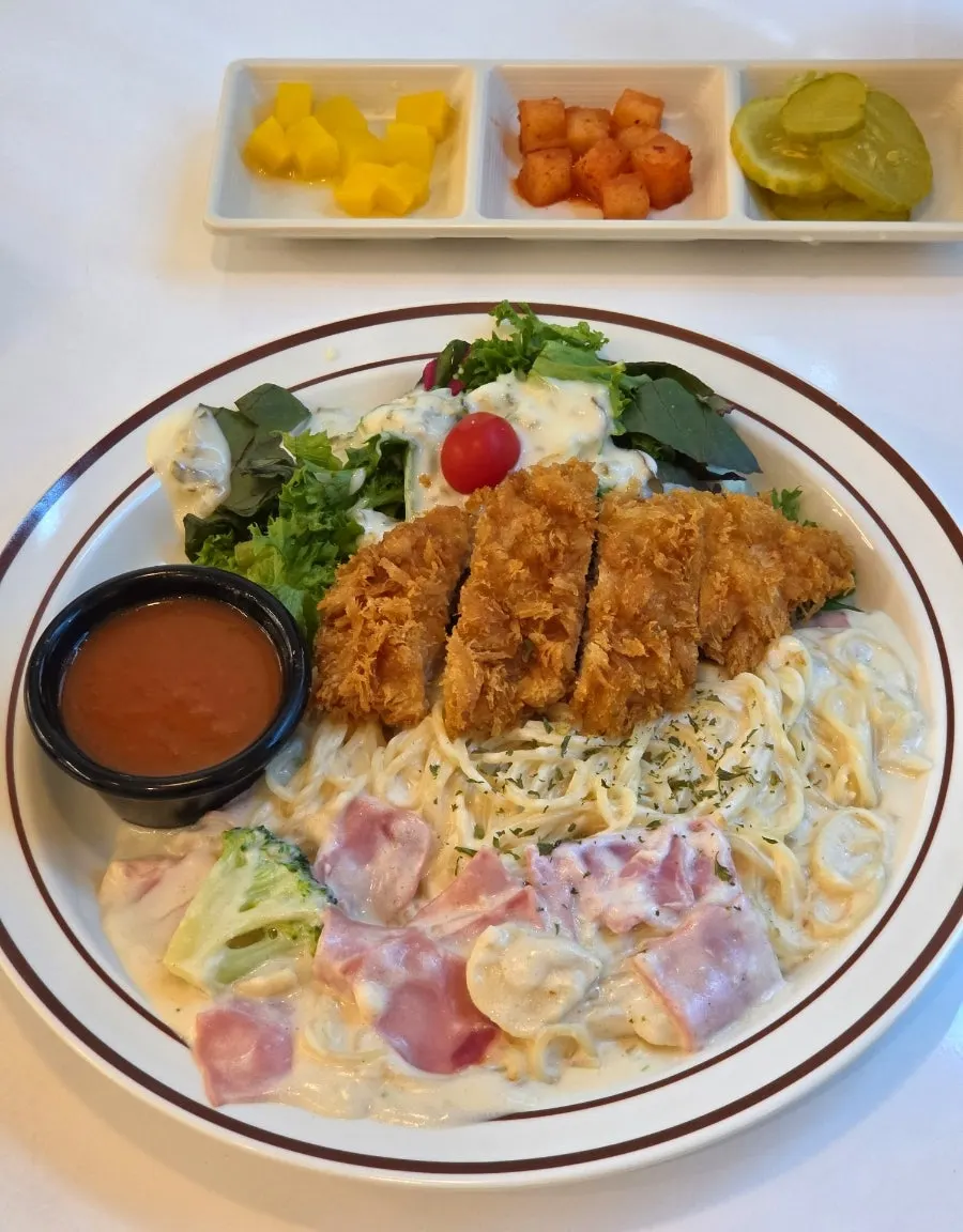 Spicy sauce served alongside the chicken cutlet