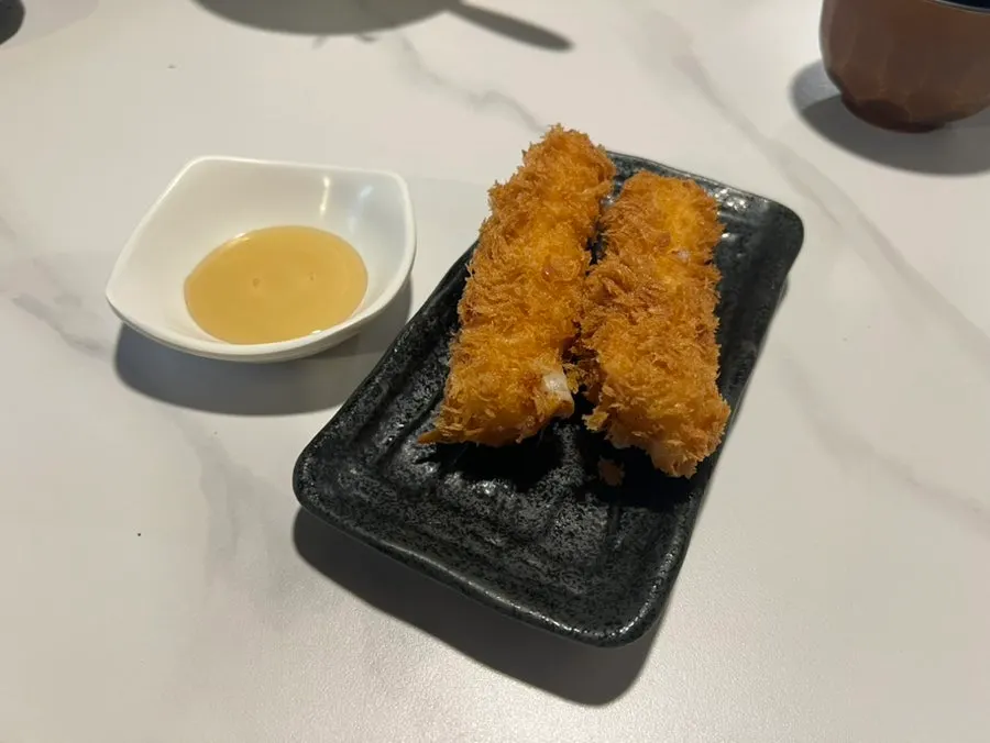 Cheese fries cut in half