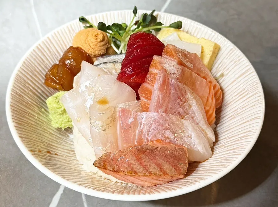 Close-up of kaisendon piled high with sashimi