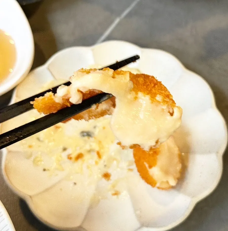 Cross-section of the crab cream croquette cut in half