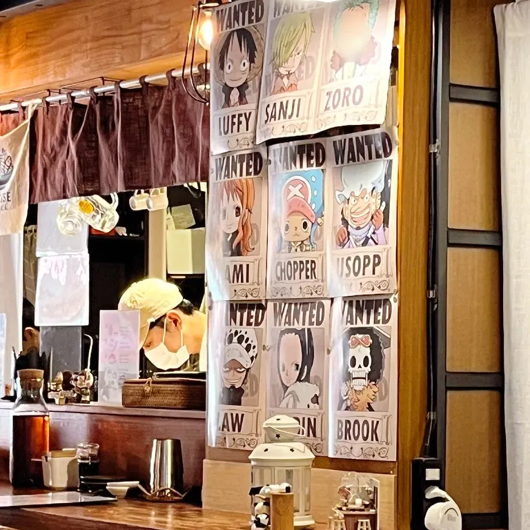 One Piece figure wanted-poster displayed on the restaurant wall