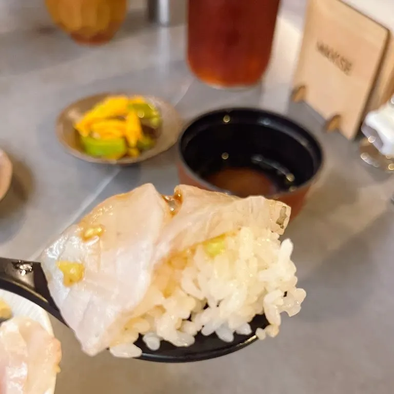 Close-up of kaisendon with seasonal fish and ankimo