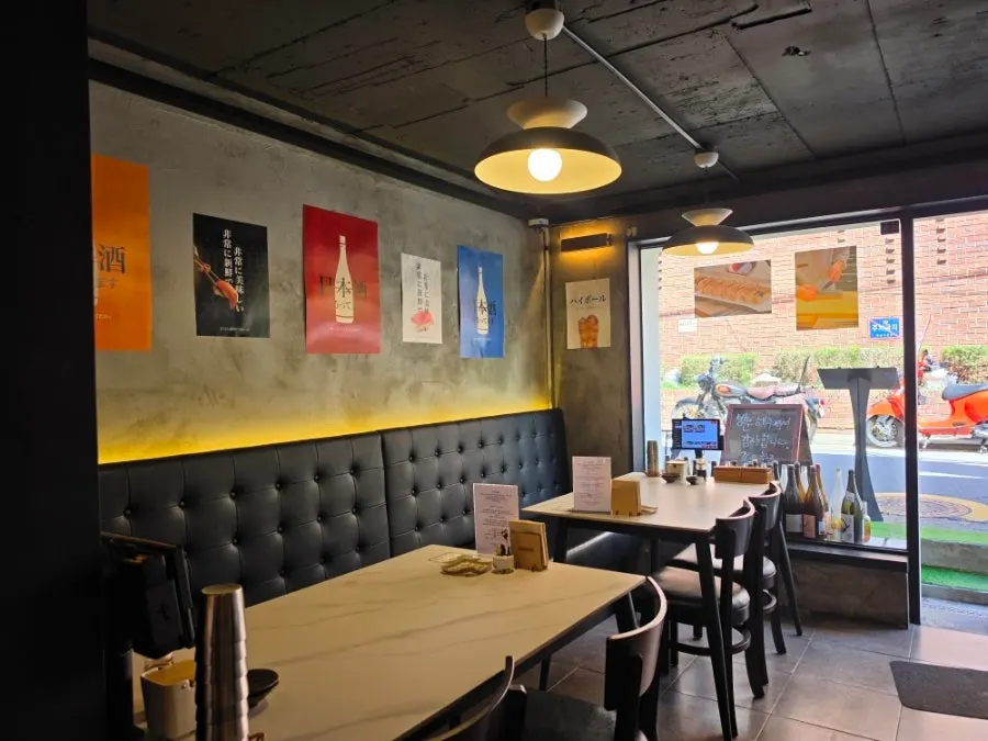 Inner seating area at Makise Hapjeong with about five tables