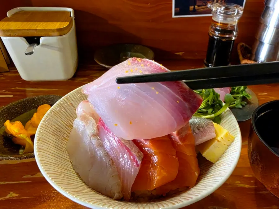 Sea bream sashimi placed on top of sushi rice