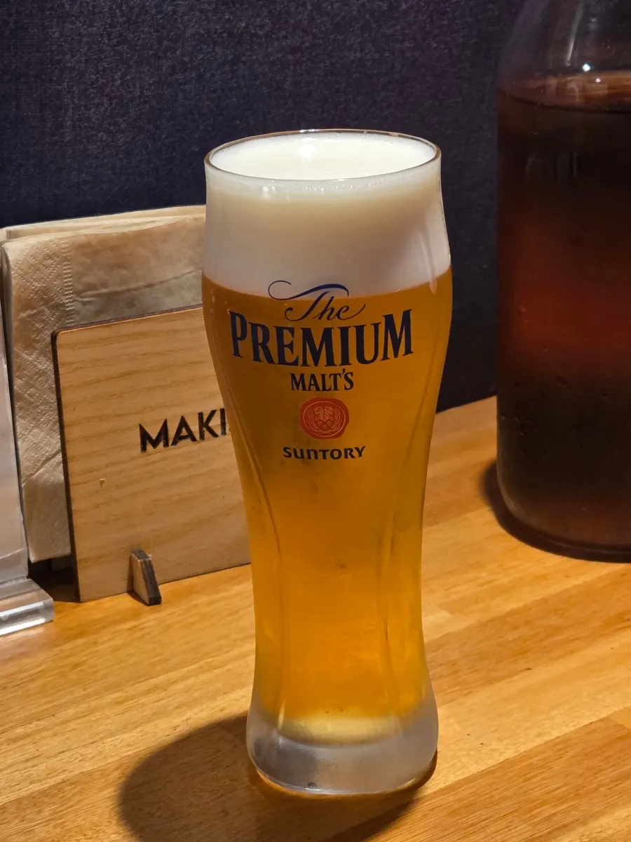 A glass of Suntory cream draft beer