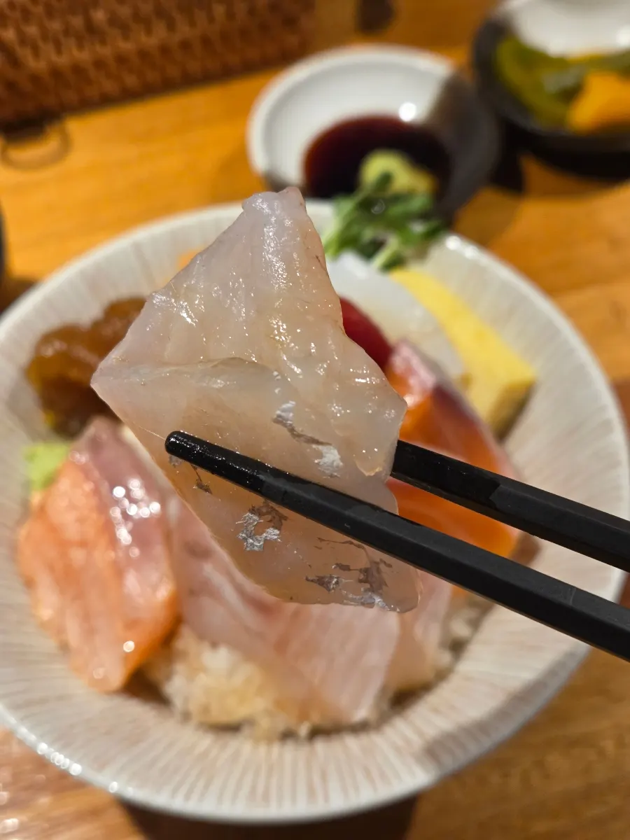 A thick slice of salmon sashimi