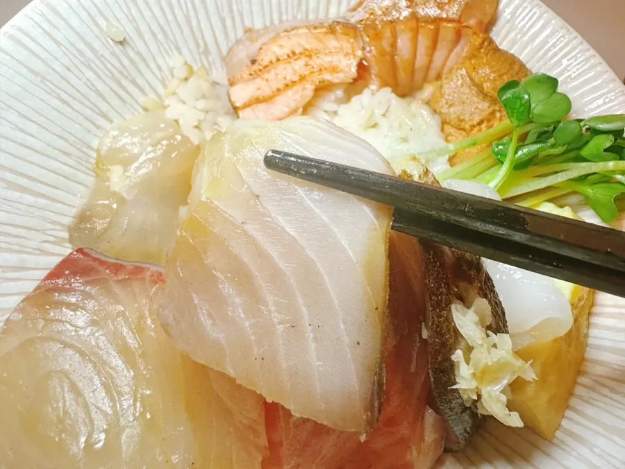 A piece of lightly seared aburi salmon