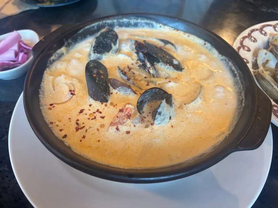 Cream arrabiata served in a stone pot