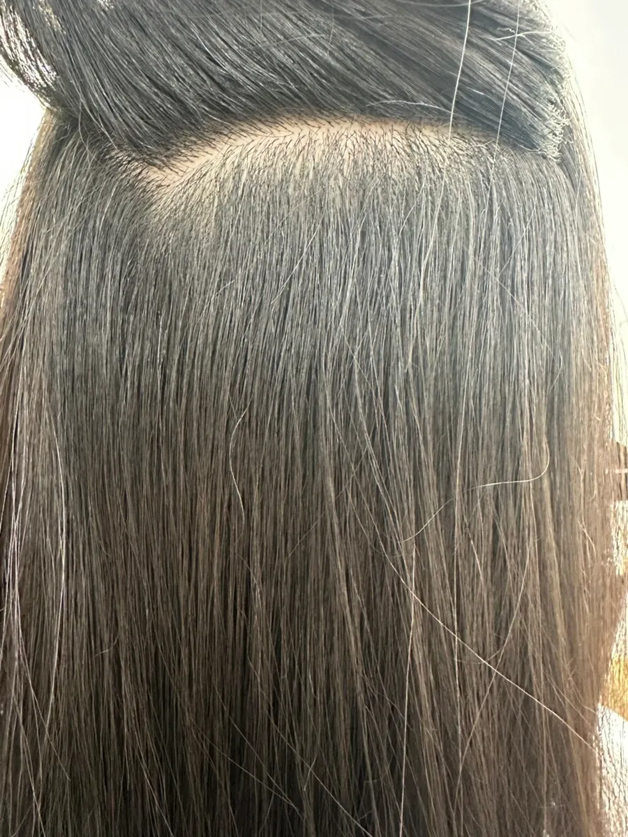 Hair smoothed straight after the magic straightening treatment