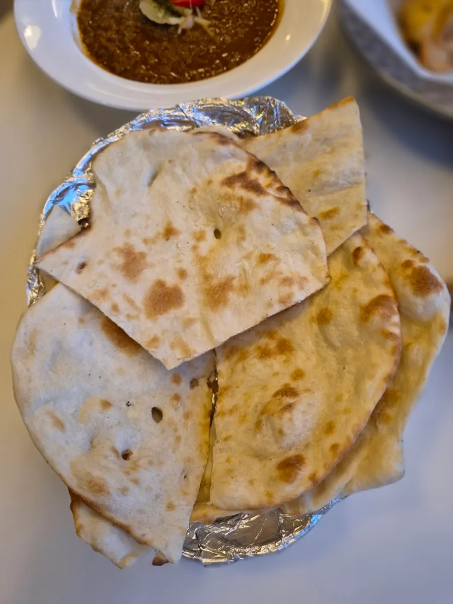 A piece of tandoori chicken at Mandala Indian Lounge