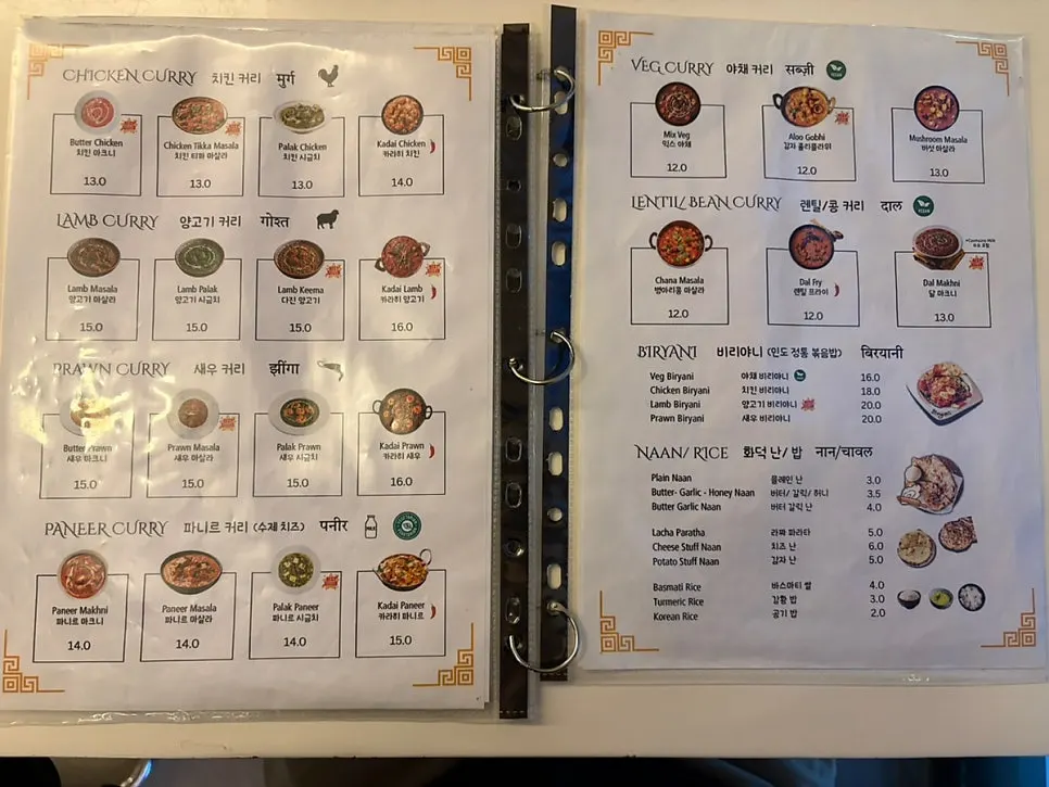 Indian food spread with drinks included