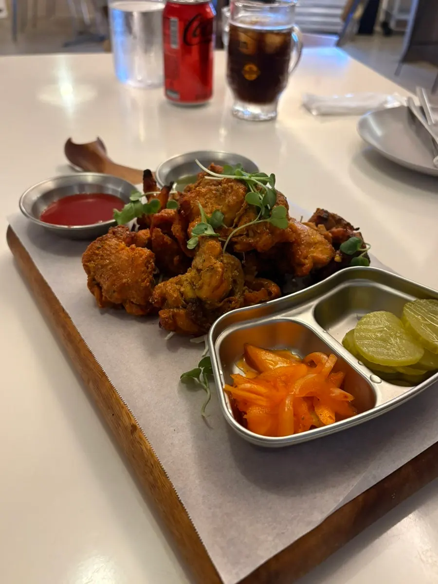 Chicken tikka served with sauce