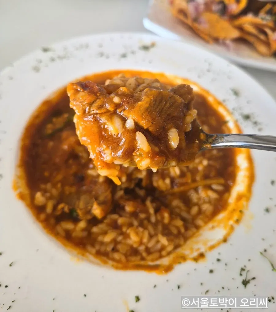 Rich masala sauce with lamb
