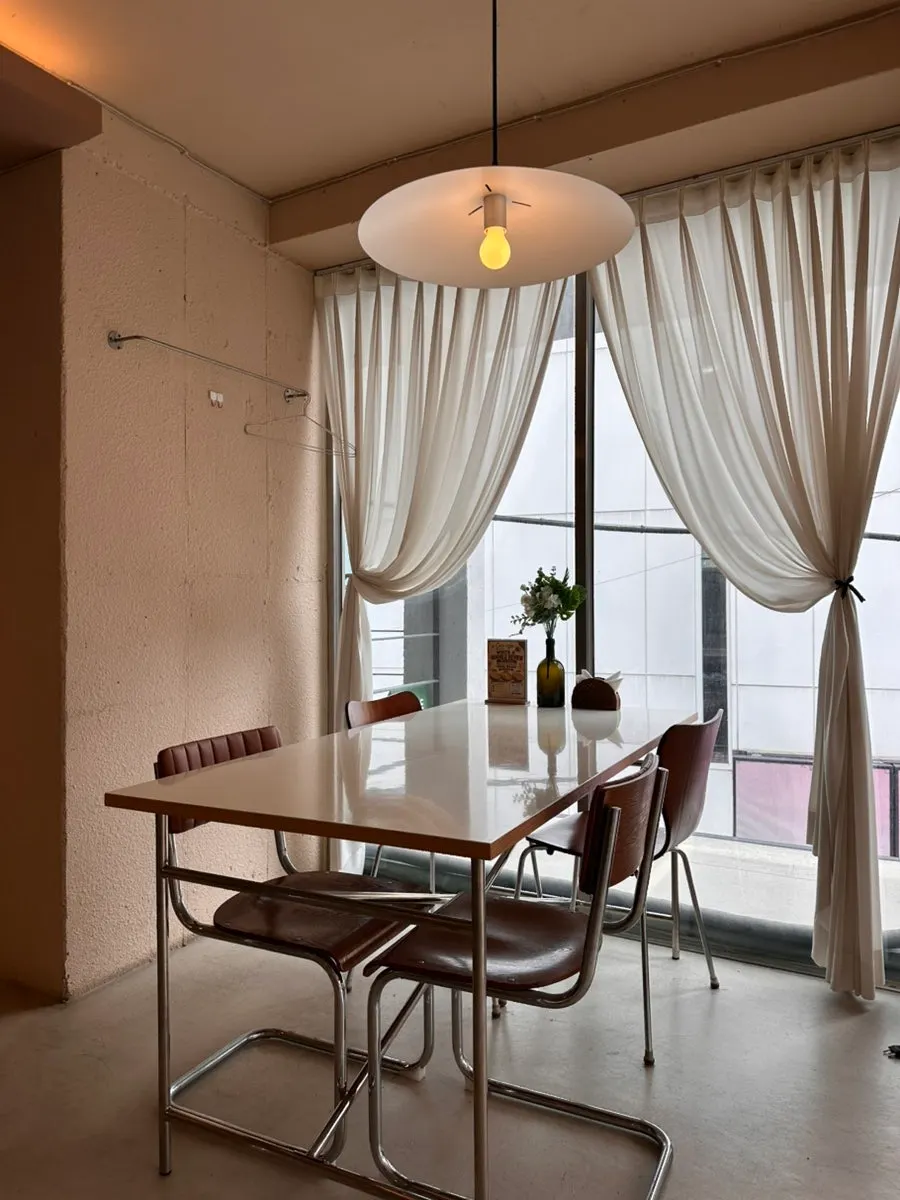 Window-side seating and a table for two