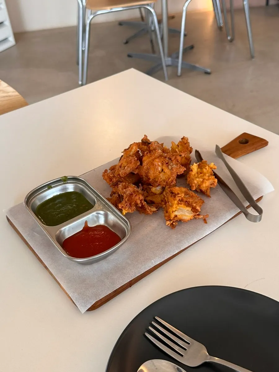 A plate of onion fritters ordered as a side dish
