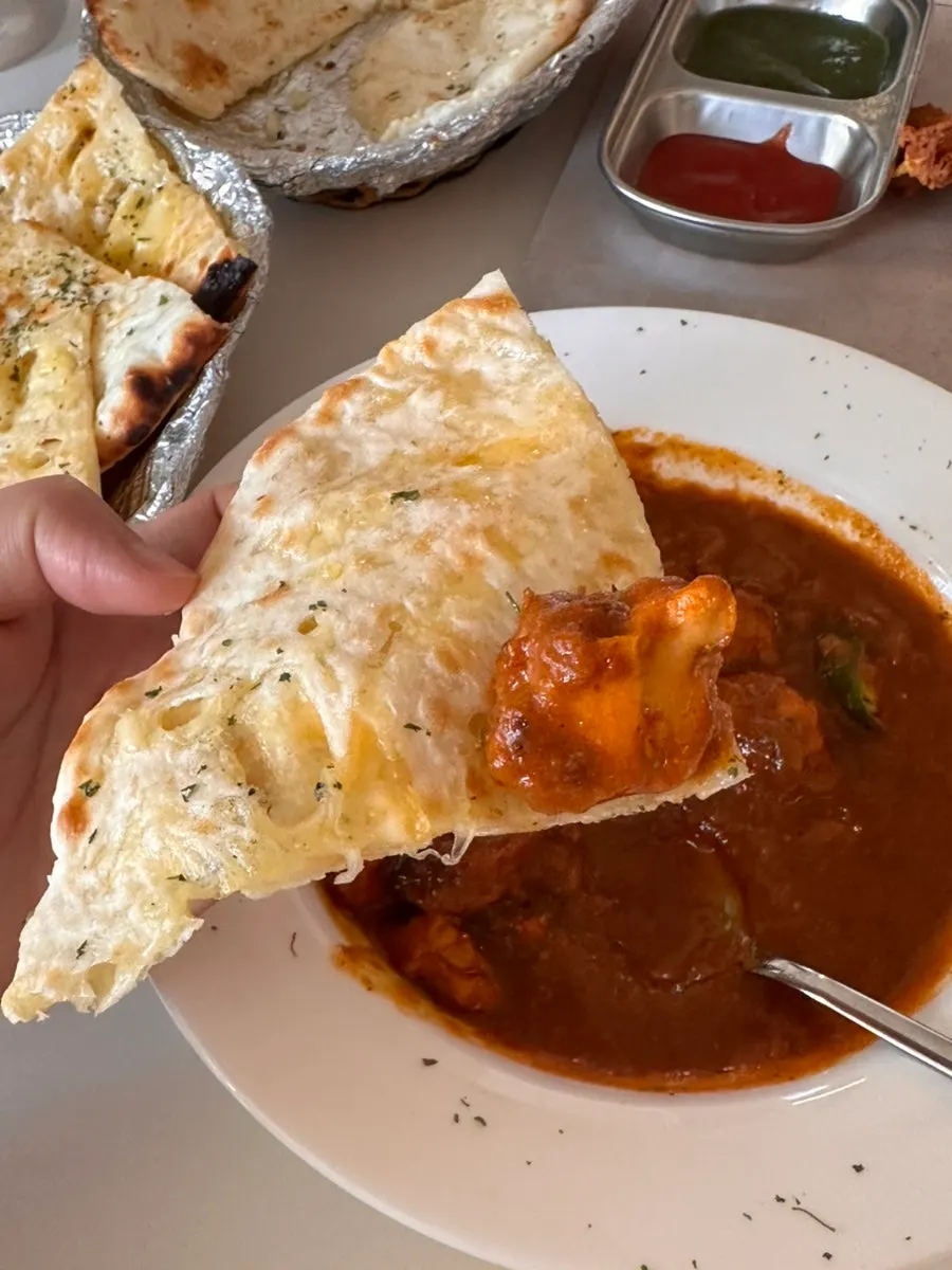 Cheese naan topped generously with cheese