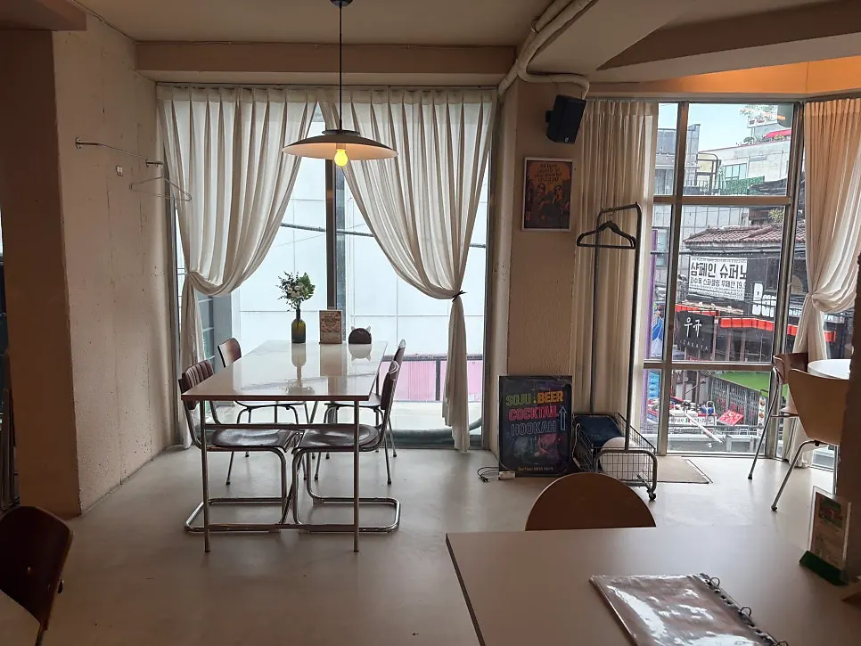 Dining hall with full windows at Mandala Indian Lounge