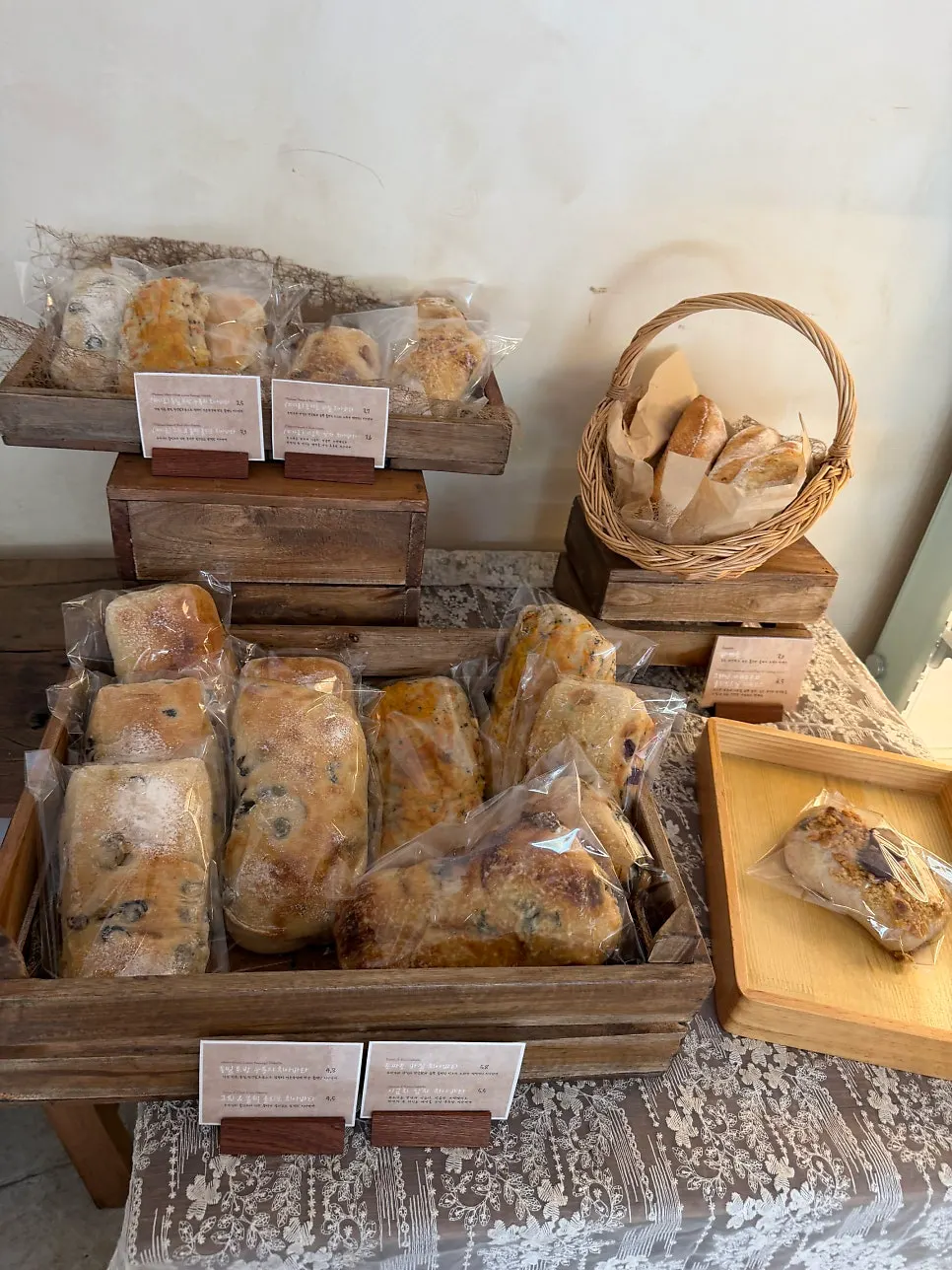 Bakery corner with bread trays and tongs