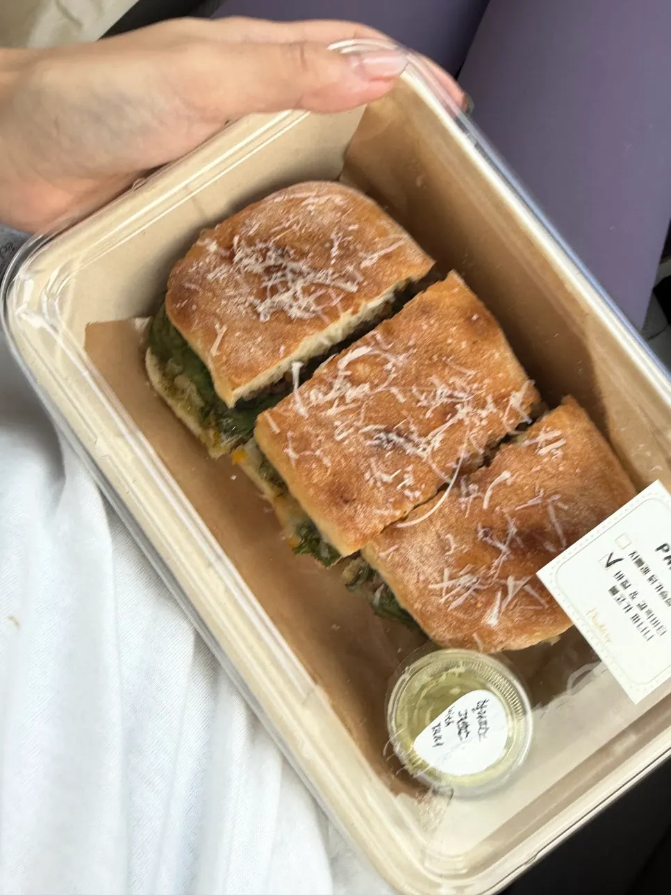 Basil garlic butter bulgogi panini cut into three pieces
