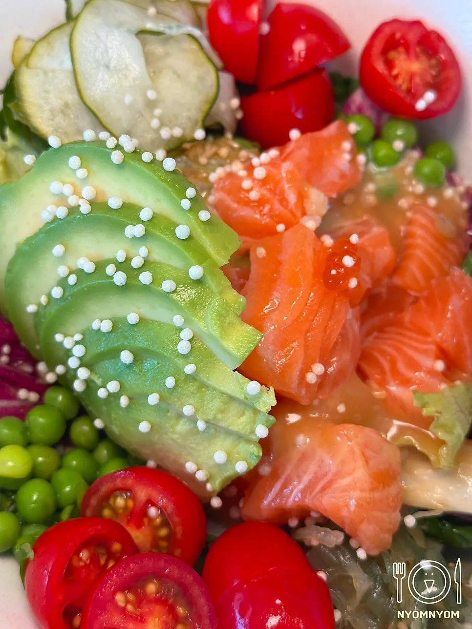 Plate of avocado salmon grain salad