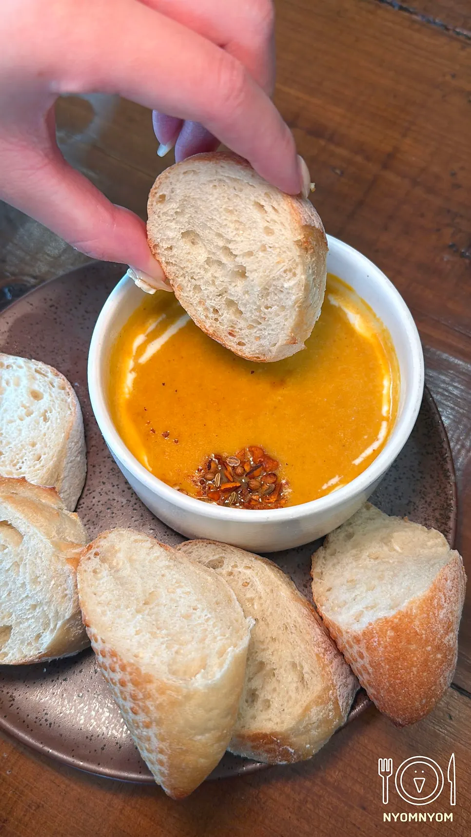 Bowl of smooth sweet pumpkin curry soup