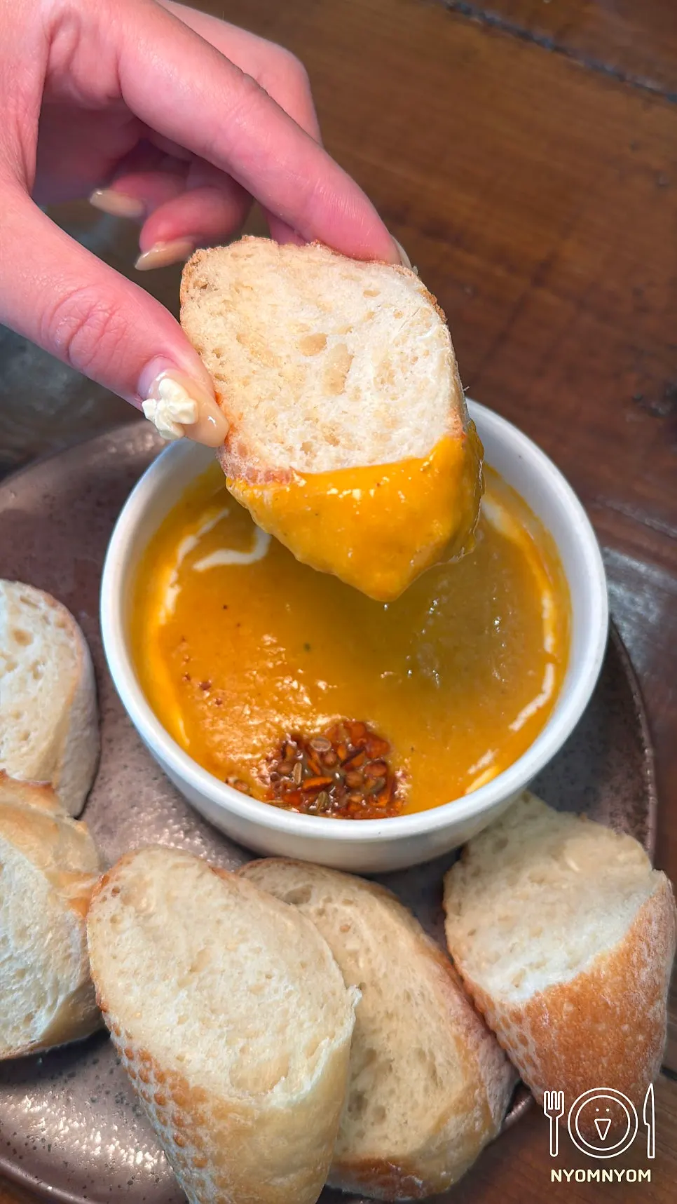 Crispy-crusted house baguette piece