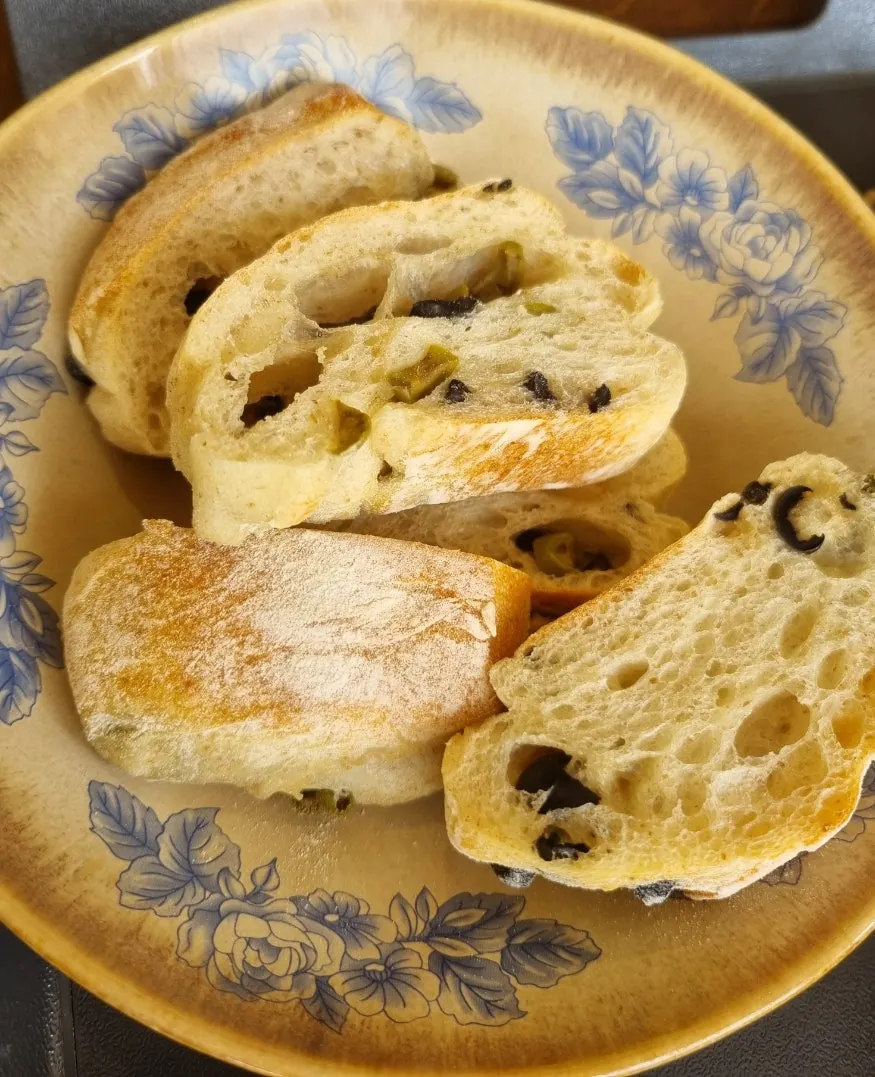 Cross-section of the green black olive ciabatta