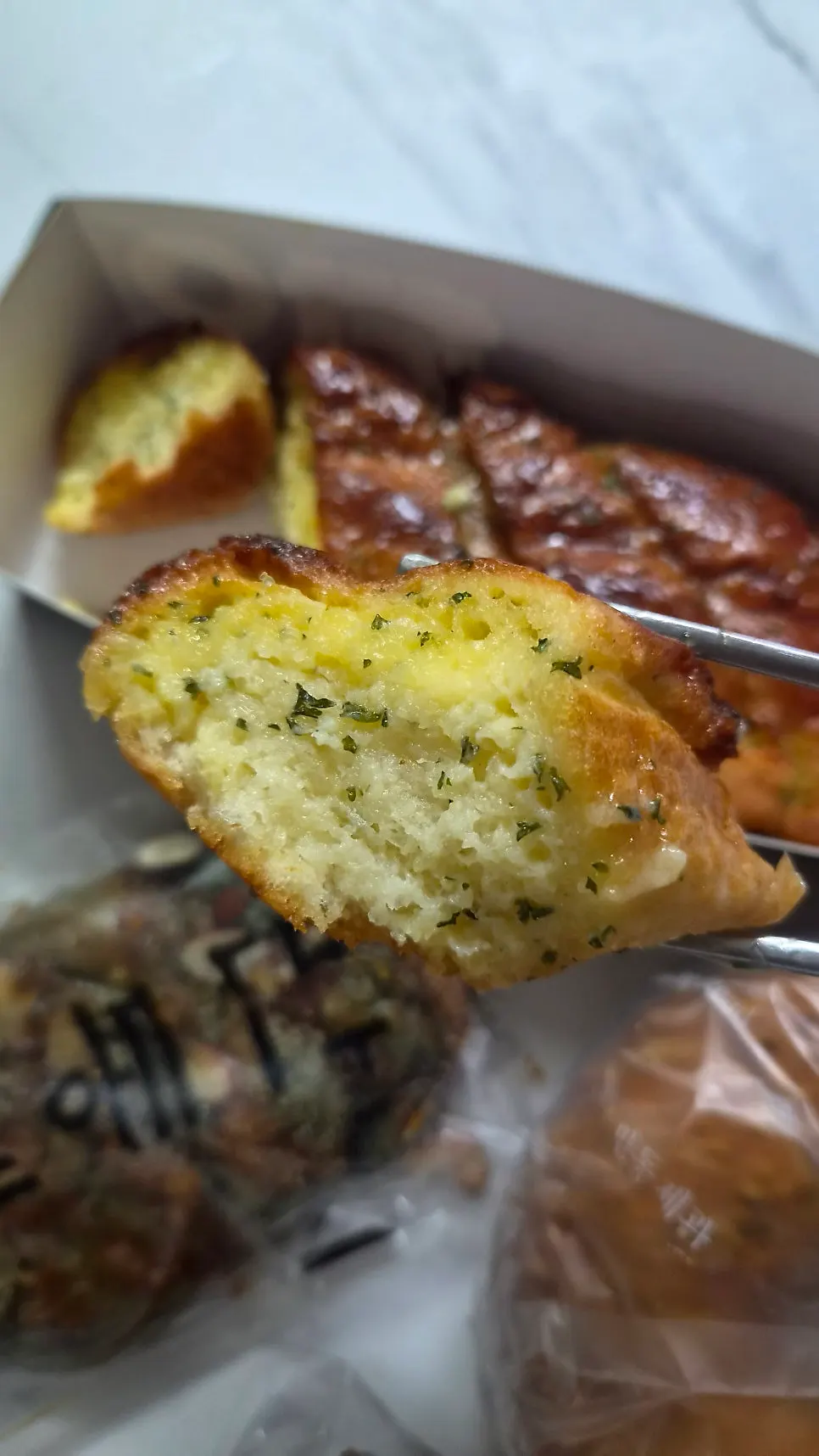 Cross-section of the reheated garlic baguette