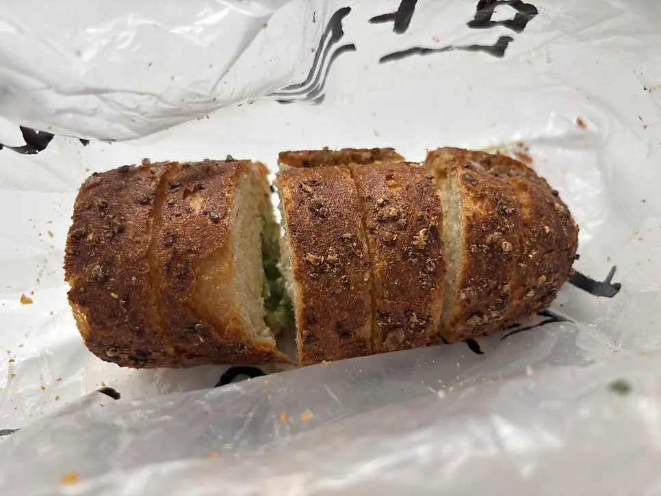 Pickle-like cucumber texture inside the baguette