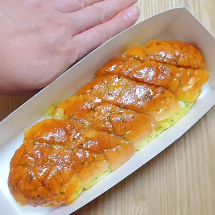 Garlic baguette eaten together with my kid