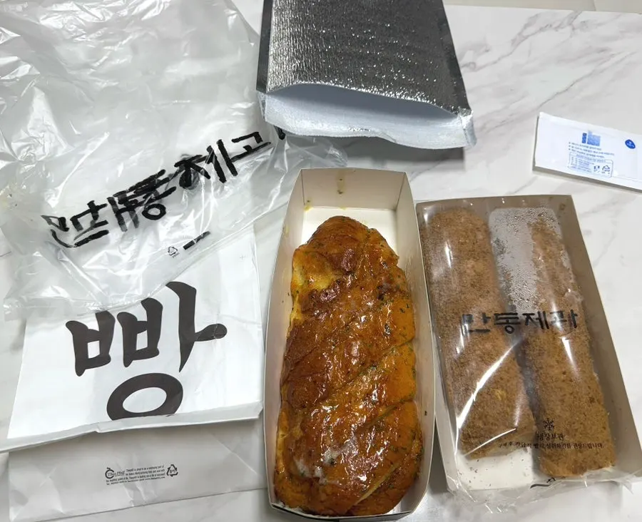 Purchased garlic baguette and cappuccino bread