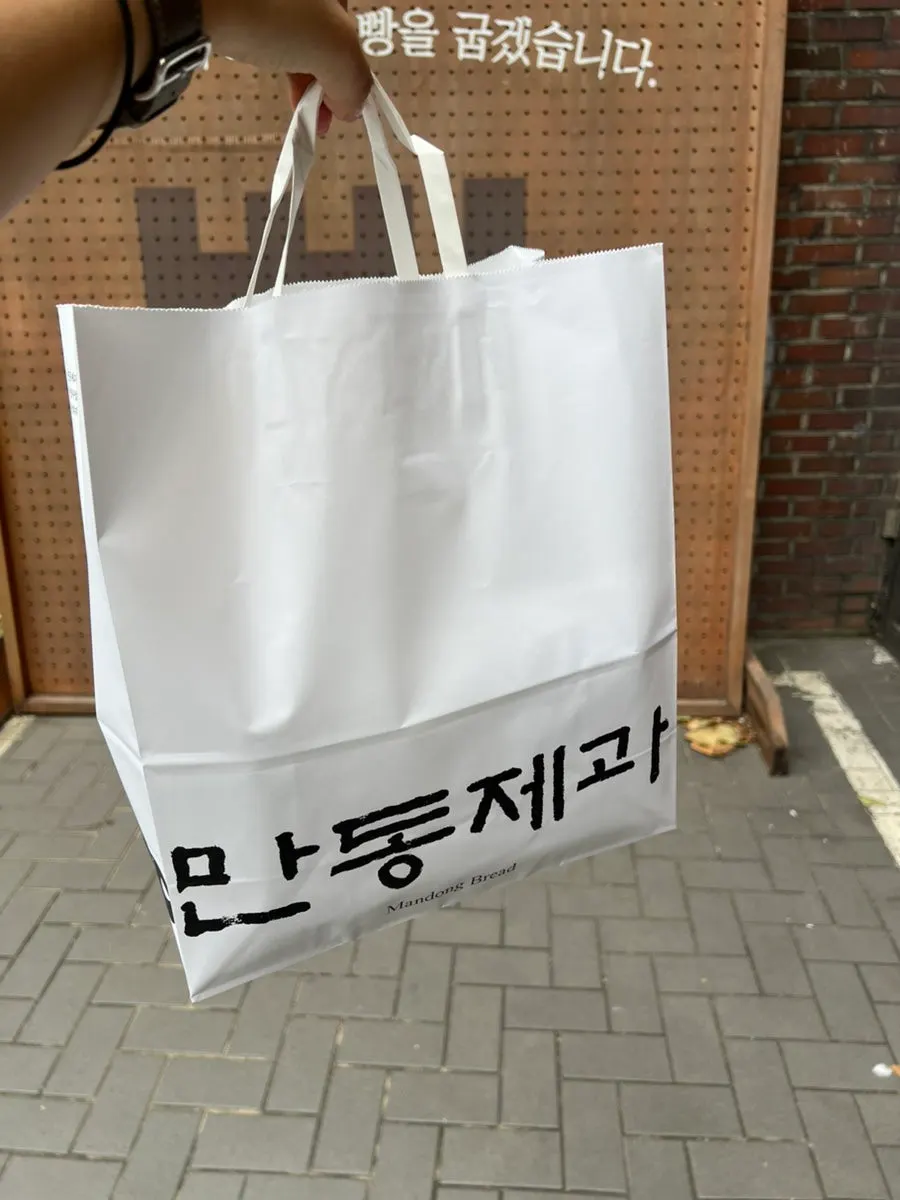 Bread packed into a shopping bag at Mandong Jegwa