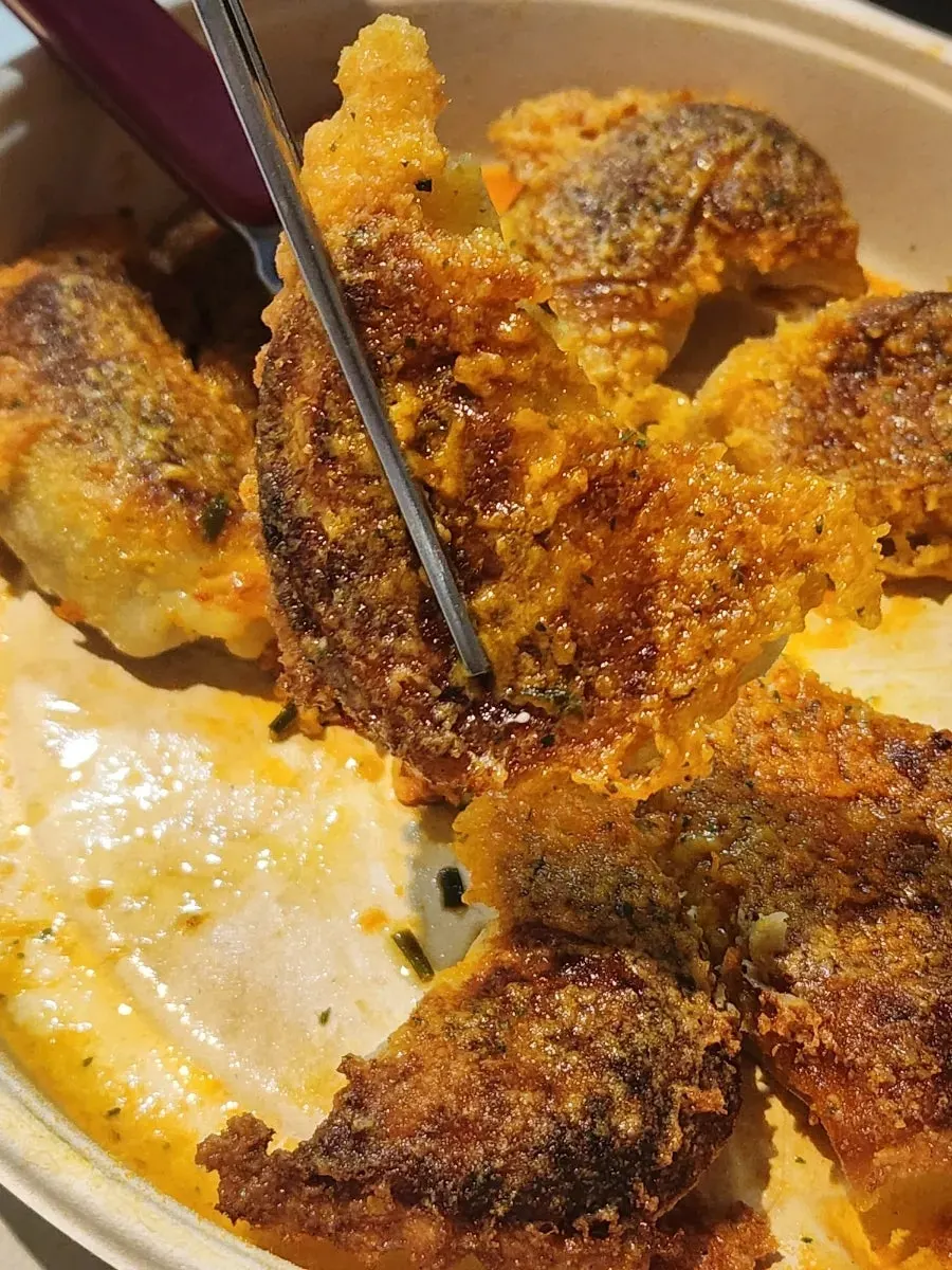 Ppuring gyoza dusted generously with cheese seasoning