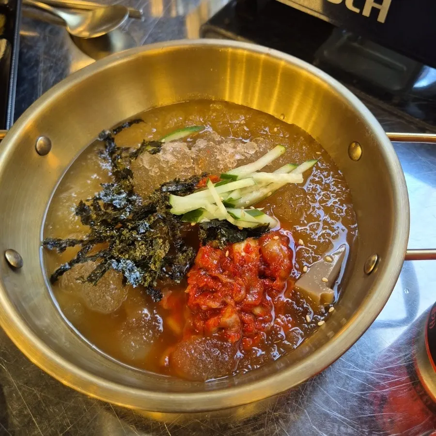 A plate of yukhoe eaten as an appetizer before the gopchang finished grilling