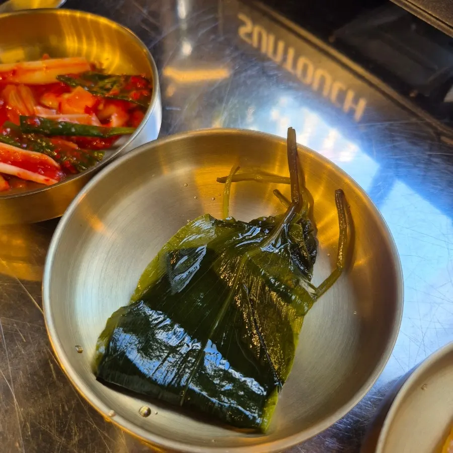 The banchan self-bar at Hwang Gop, stocked even with myeongi-namul