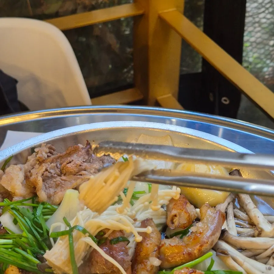 The full mixed platter piled high on the grill