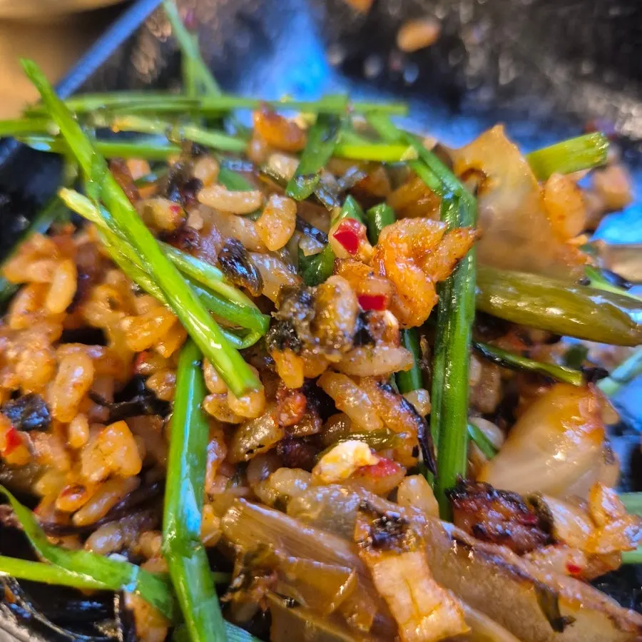 Fried rice topped with chives from the self-bar