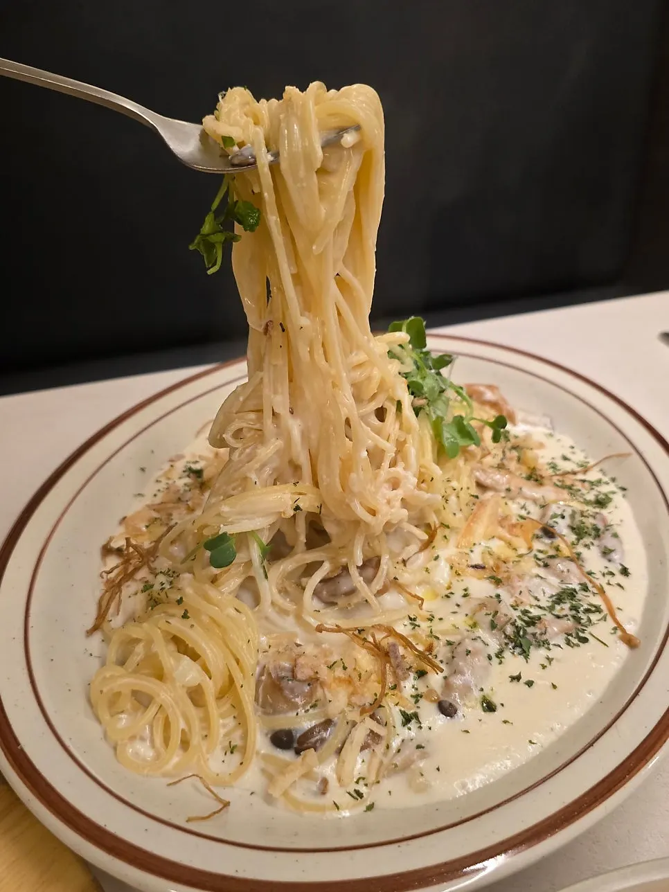 Lifted noodles of the cod roe carbonara