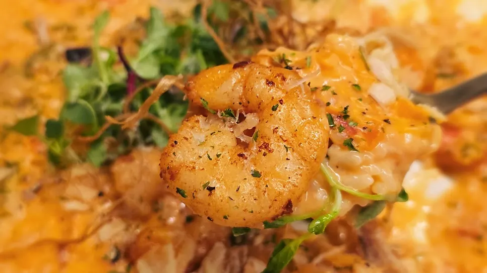 Plump grilled cocktail shrimp on top