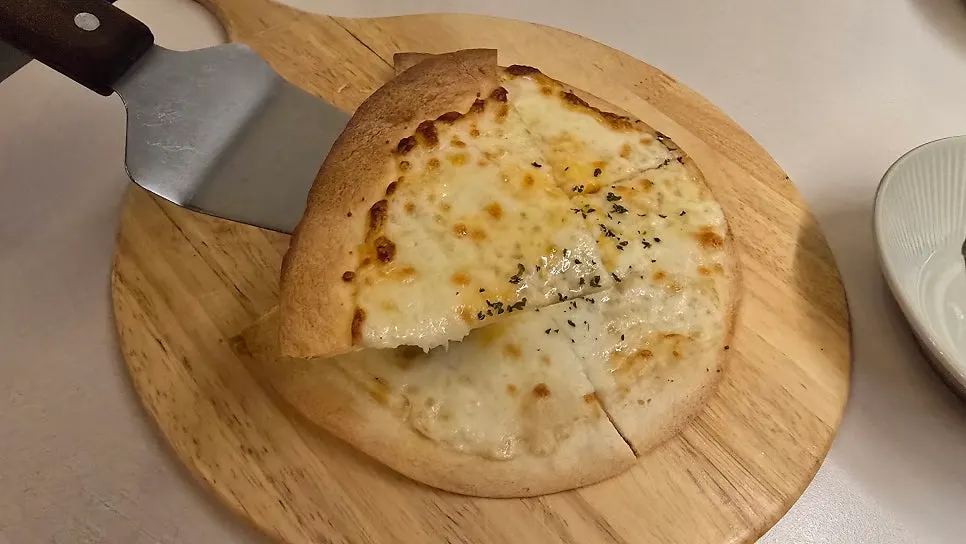 8-inch mini honey pizza baked on a tortilla