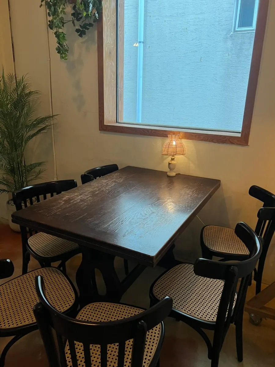 Dimly lit 2nd floor seating at 5to7
