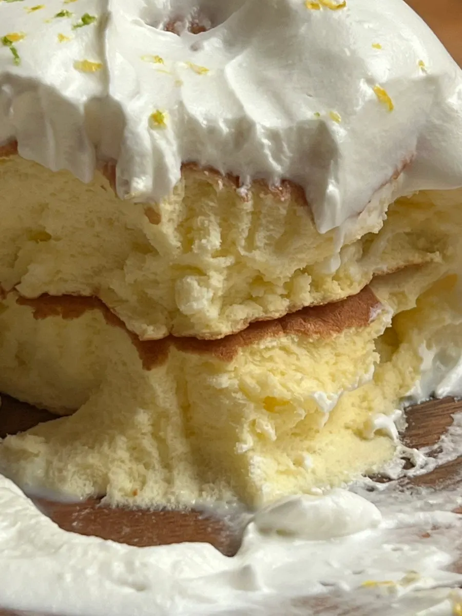 Cross-section of the mangosteen soufflé with whipped cream