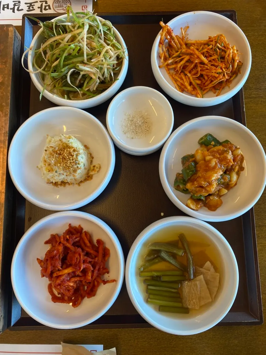 Basic side dish spread including yukhoe and jeon