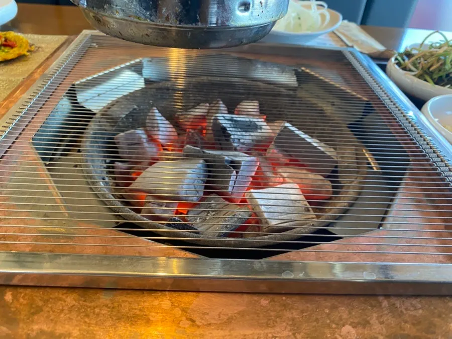 Charcoal brazier set up at the table