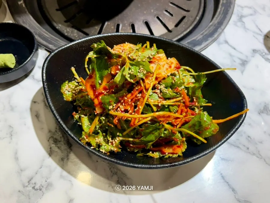Myeongi namul and white kimchi wrap side dishes