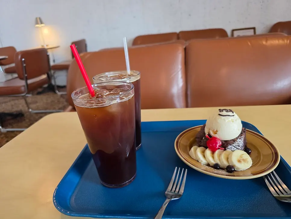 Brownie served with banana and ice cream