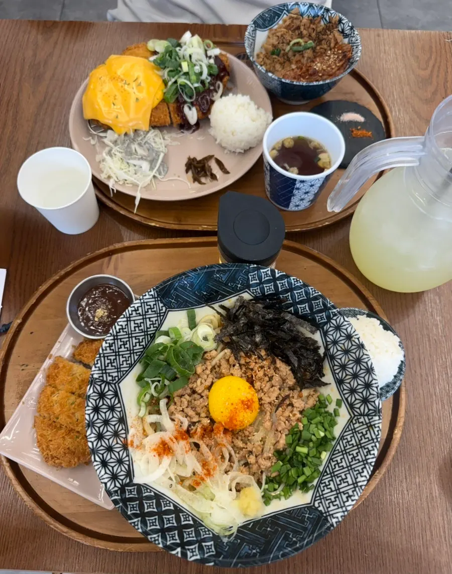 Four dishes laid out from the two-person set