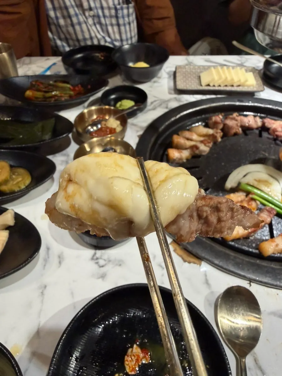 Grilled samgyeopsal topped with myeong-i namul